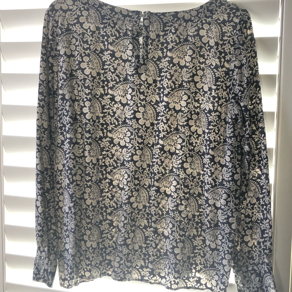 Floral blouse with button up keyhole back
